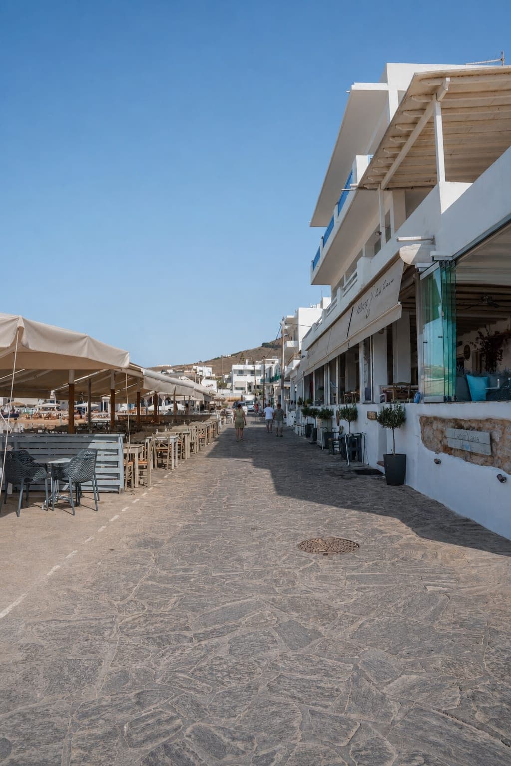 Fishing boats and waterfront scenery in Piso Livadi, Paros