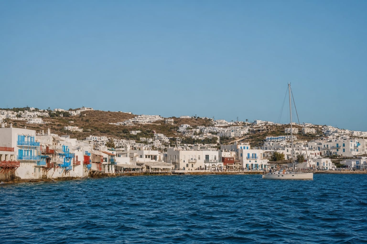 Views of Little Venice in Mykonos from a boat.