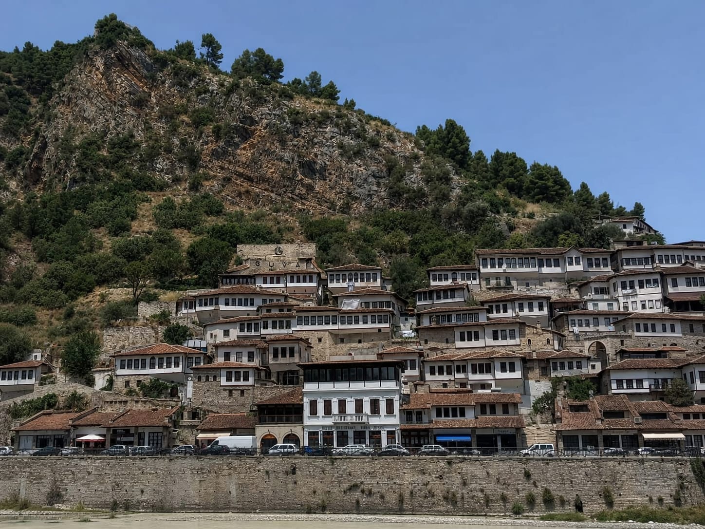 White stone houses overlooking the river in historic Berat
