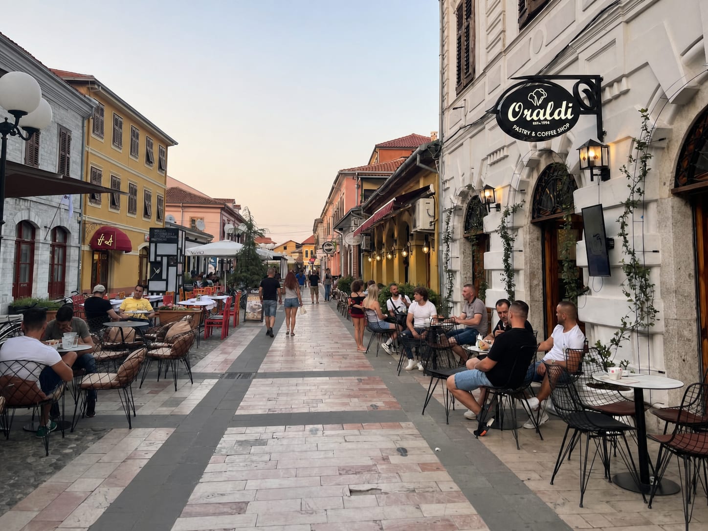 Pedestrian walking street lined with buildings in Shkoder, Albania