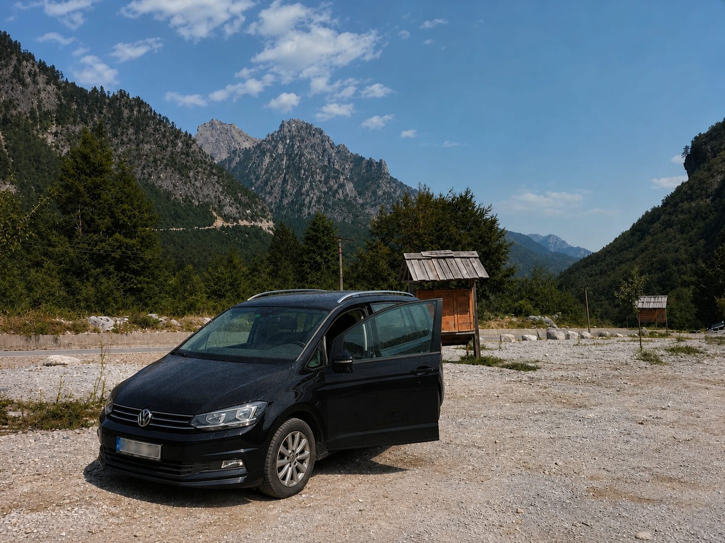 Rental car on a mountain road in Theth, Albania.