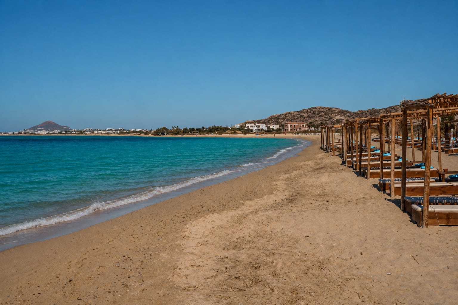 Plaka Beach on Naxos, known for its long sandy shoreline.