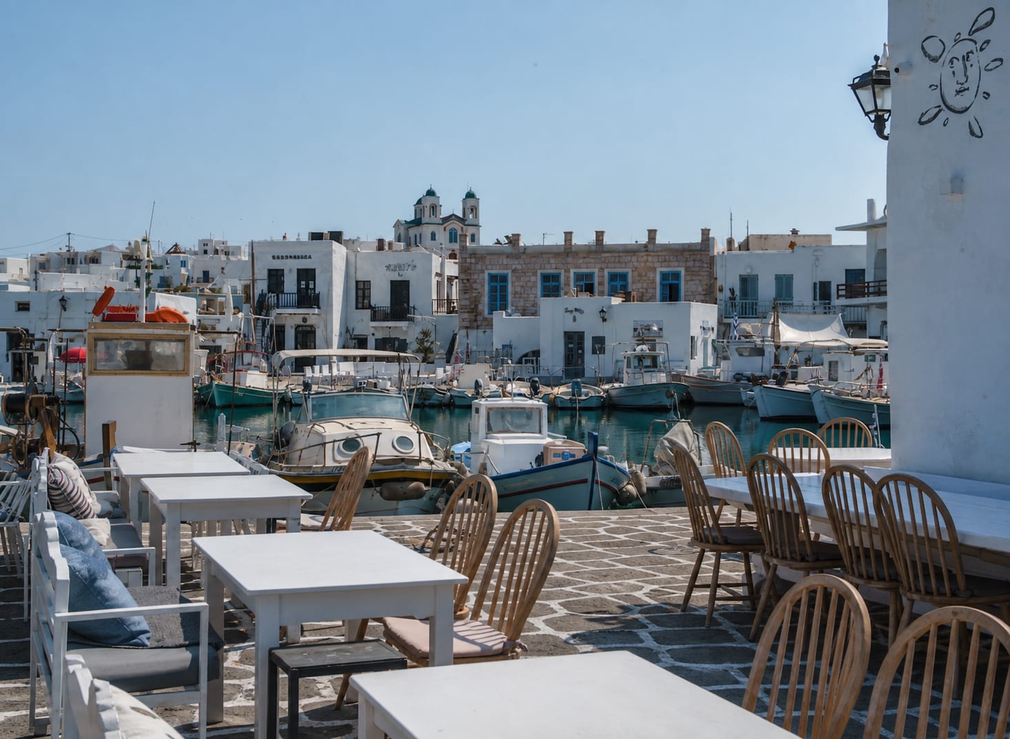 Restaurants in Naoussa, Paros, along charming streets near the harbor.