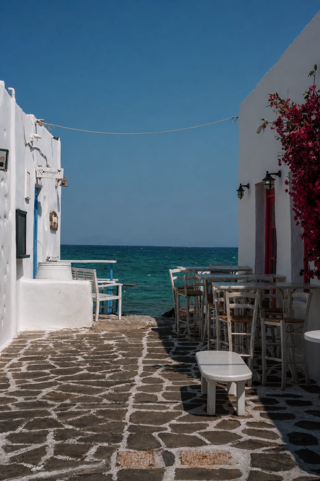Traditional harbor and whitewashed buildings in Naoussa, Paros, Greece