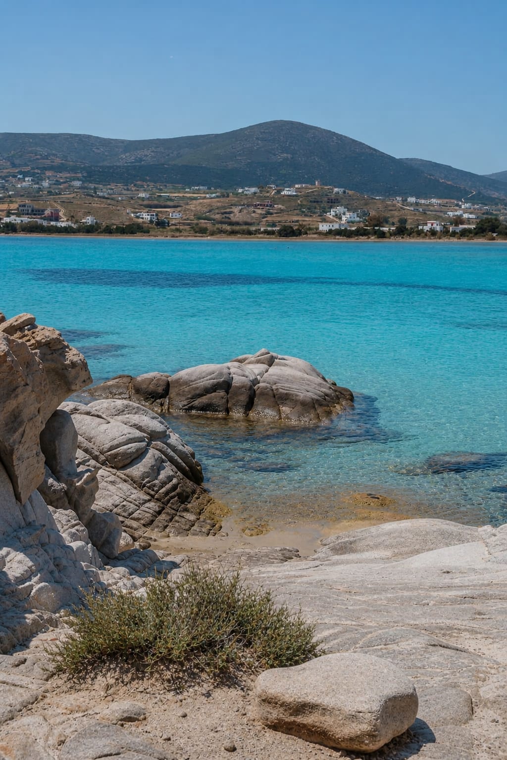 Kolymbithres Beach on Paros featuring smooth rocks and shallow water