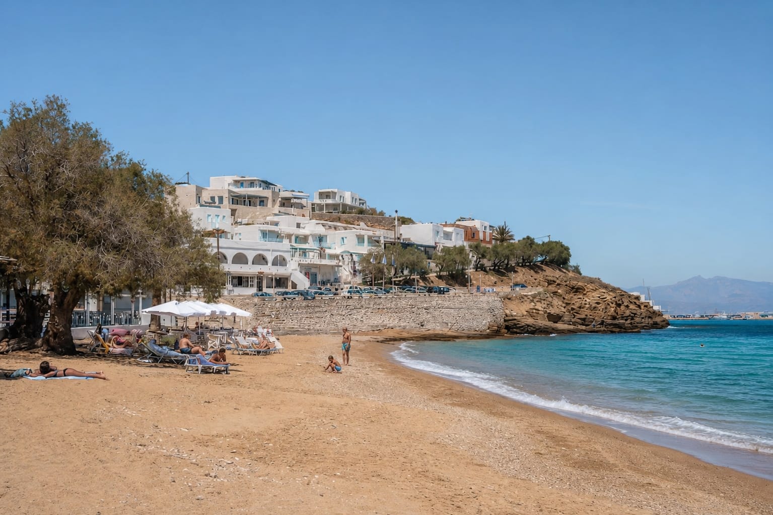 Logaras Beach on Paros with sandy coast and calm blue water