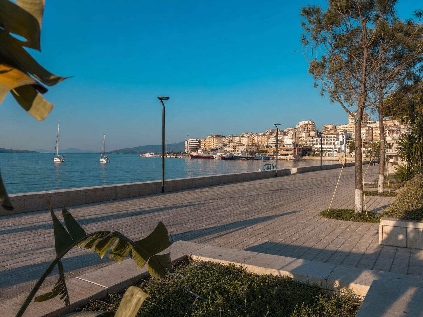 Sarandë promenade along the waterfront in the early morning.