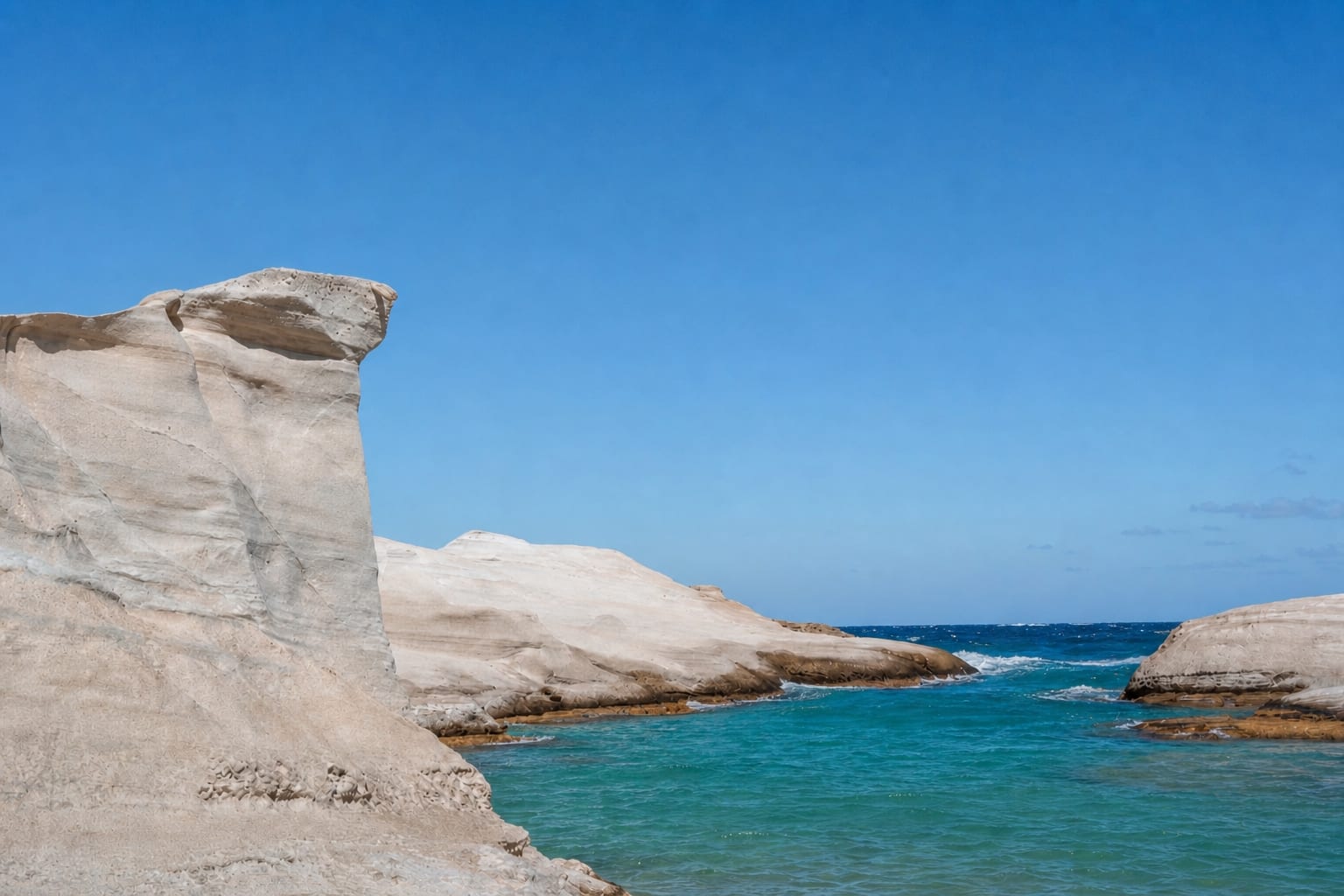 White volcanic rock landscape at Sarakiniko Beach in Milos.
