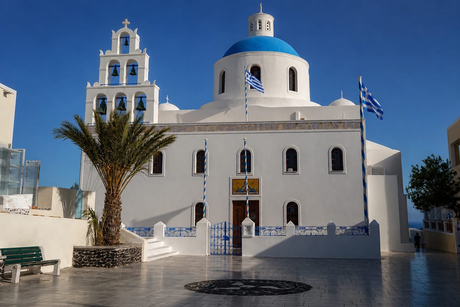 Blue-domed church and whitewashed architecture in Oia, Santorini