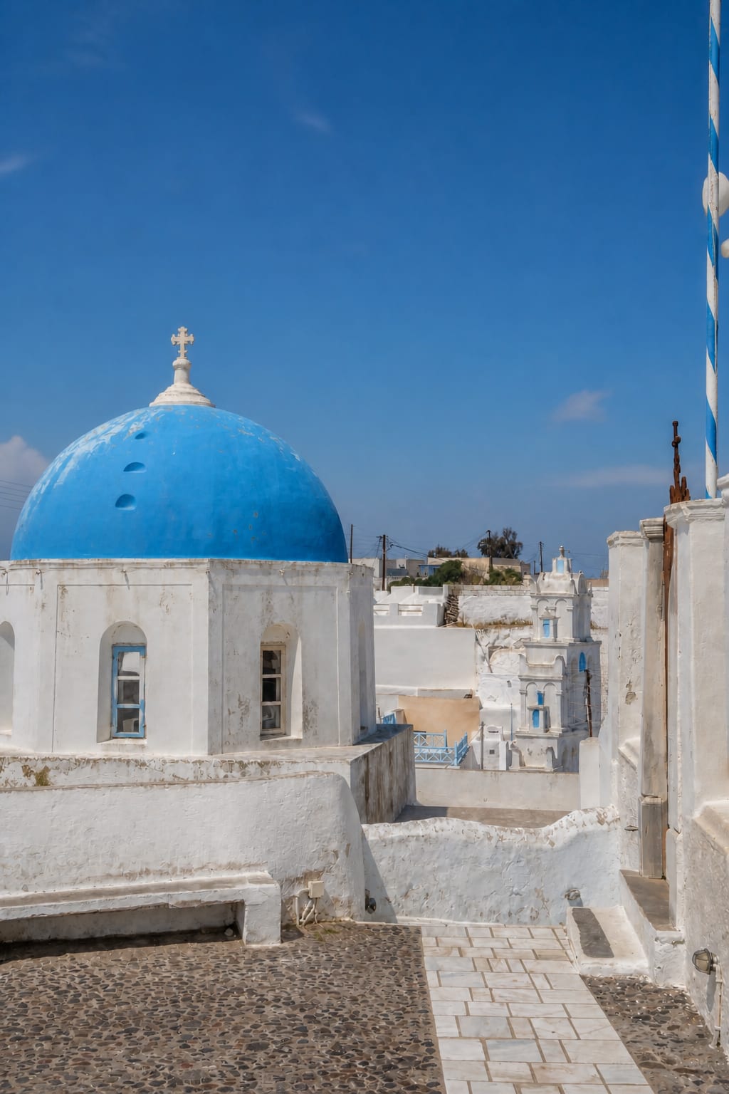 Whitewashed houses and quiet lanes in Megalochori village, Santorini